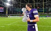 27 August 2022; Northwestern Wildcats quarterback Ryan Hilinski celebrates with the trophy  after the Aer Lingus College Football Classic 2022 match between Northwestern Wildcats and Nebraska Cornhuskers at Aviva Stadium in Dublin. Photo by Brendan Moran/Sportsfile