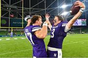 27 August 2022; Northwestern Wildcats quarterback Ryan Hilinski, right, and punter Luke Akers celebrate after the Aer Lingus College Football Classic 2022 match between Northwestern Wildcats and Nebraska Cornhuskers at Aviva Stadium in Dublin. Photo by Brendan Moran/Sportsfile