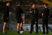 29 August 2022; Bohemians assistant manager Trevor Croly, second from right, speaking to Bohemians performance coach Philip McMahon during the SSE Airtricity League Premier Division match between Bohemians and St Patrick's Athletic at Dalymount Park in Dublin. Photo by Eóin Noonan/Sportsfile