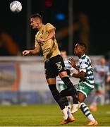 25 August 2022; Adnan Kovacevic of Ferencváros in action against Aidomo Emakhu of Shamrock Rovers during the UEFA Europa League Play-Off Second Leg match between Shamrock Rovers and Ferencvaros at Tallaght Stadium in Dublin. Photo by Eóin Noonan/Sportsfile