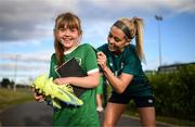 30 August 2022; Denise O'Sullivan meets supporter Abbie Kinsella, age 8, from Lusk United, after a Republic of Ireland Women training session at the FAI National Training Centre in Abbotstown, Dublin. Photo by Stephen McCarthy/Sportsfile