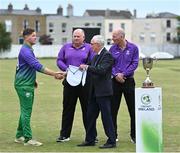 28 August 2022; Cricket Ireland president David Griffin makes a presentation to Terenure captain Donal Lynch before the Clear Currency National Cup Final match between North County and Terenure at Leinster Cricket Club in Dublin. Photo by Piaras Ó Mídheach/Sportsfile