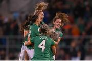 1 September 2022; Republic of Ireland players celebrate their side's first goal, scored by Lily Agg, hidden, during the FIFA Women's World Cup 2023 qualifier match between Republic of Ireland and Finland at Tallaght Stadium in Dublin. Photo by Stephen McCarthy/Sportsfile