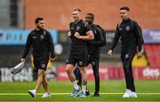 2 September 2022; Bohemians players, from left, Jordan Doherty, Ciarán Kelly, Junior Ogedi-Uzokwe and Josh Kerr arrive before the SSE Airtricity League Premier Division match between Bohemians and Shamrock Rovers at Dalymount Park in Dublin. Photo by Seb Daly/Sportsfile