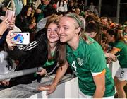 1 September 2022; Louise Quinn of Republic of Ireland with supporters after the FIFA Women's World Cup 2023 qualifier match between Republic of Ireland and Finland at Tallaght Stadium in Dublin. Photo by Seb Daly/Sportsfile