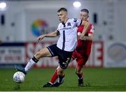 2 September 2022; Lewis Macari of Dundalk in action against Jack Moylan of Shelbourne during the SSE Airtricity League Premier Division match between Dundalk and Shelbourne at Casey's Field in Dundalk, Louth. Photo by Ben McShane/Sportsfile