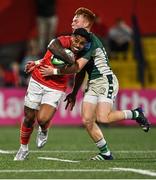 2 September 2022; Malakai Fekitoa of Munster is tackled by Caolan Englefield of London Irish during the pre-season friendly match between Munster and London Irish at Musgrave Park in Cork. Photo by Piaras Ó Mídheach/Sportsfile