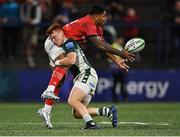 2 September 2022; Malakai Fekitoa of Munster is tackled by Caolan Englefield of London Irish during the pre-season friendly match between Munster and London Irish at Musgrave Park in Cork. Photo by Piaras Ó Mídheach/Sportsfile