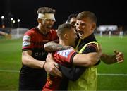 2 September 2022; Liam Burt celebrates with his Bohemians team-mates Rory Feely, left, and Declan McDaid, hidden, and a ballboy after scoring their side's goal during the SSE Airtricity League Premier Division match between Bohemians and Shamrock Rovers at Dalymount Park in Dublin. Photo by Stephen McCarthy/Sportsfile
