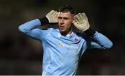 2 September 2022; Longford Town goalkeeper Luke Dennison gestures towards the Cork City fans in celebration of his side's second goal, scored by Jordan Adeyemo, during the SSE Airtricity League First Division match between Cork City and Longford Town at Turners Cross in Cork. Photo by Michael P Ryan/Sportsfile