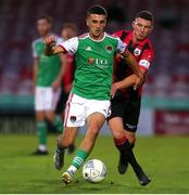 2 September 2022; Barry Coffey of Cork City in action against Aaron Robinson of Longford Town during the SSE Airtricity League First Division match between Cork City and Longford Town at Turners Cross in Cork. Photo by Michael P Ryan/Sportsfile
