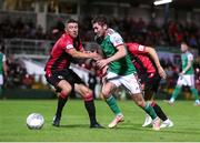 2 September 2022; James Doona of Cork City in action against Aaron Robinson of Longford Town during the SSE Airtricity League First Division match between Cork City and Longford Town at Turners Cross in Cork. Photo by Michael P Ryan/Sportsfile