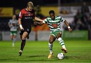 2 September 2022; Aidomo Emakhu of Shamrock Rovers in action against Kris Twardek of Bohemians during the SSE Airtricity League Premier Division match between Bohemians and Shamrock Rovers at Dalymount Park in Dublin. Photo by Seb Daly/Sportsfile