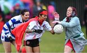 3 September 2022; Wanita Phakerood of Clann na Banna, Down, centre, Aisling Boland of Navan O'Mahony's, Meath, right, during the Sports Direct Gaelic4Mothers&Others National Blitz day, hosted by the Naomh Mearnóg & St Sylvester’s GAA clubs in Dublin. Photo by Piaras Ó Mídheach/Sportsfile