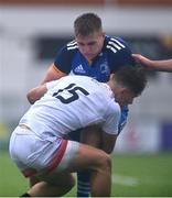 3 September 2022; Finn Treacy of Leinster is tackled by Ben McFarlane of Ulster during the U19 Age-Grade Interprovincial Series match between Leinster and Ulster at Energia Park in Dublin. Photo by Ben McShane/Sportsfile