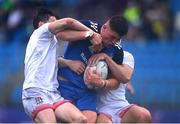 3 September 2022; Stephen Smyth of Leinster is tackled by Ethan Graham, left, and Ben Gibson of Ulster during the U19 Age-Grade Interprovincial Series match between Leinster and Ulster at Energia Park in Dublin. Photo by Ben McShane/Sportsfile