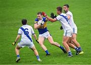 3 September 2022; Senan Forker of Castleknock is tackled by Daniel Grobbelaar of Round Towers Lusk during the Dublin County Senior Club Football Championship Group 4 match between Castleknock and Round Towers Lusk at Parnell Park in Dublin. Photo by Eóin Noonan/Sportsfile