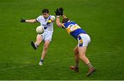 3 September 2022; Jack Hussey of Round Towers Lusk has a shot blocked by Darragh Warnockof Castleknock during the Dublin County Senior Club Football Championship Group 4 match between Castleknock and Round Towers Lusk at Parnell Park in Dublin. Photo by Eóin Noonan/Sportsfile
