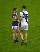 3 September 2022; Tom Quinn of Castleknock with Sean Flood of Round Towers Lusk after the Dublin County Senior Club Football Championship Group 4 match between Castleknock and Round Towers Lusk at Parnell Park in Dublin. Photo by Eóin Noonan/Sportsfile