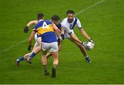 3 September 2022; Sean Flood of Round Towers Lusk in action against Paul Burke of Castleknock during the Dublin County Senior Club Football Championship Group 4 match between Castleknock and Round Towers Lusk at Parnell Park in Dublin. Photo by Eóin Noonan/Sportsfile