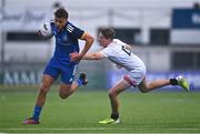 3 September 2022; Todd Lawlor of Leinster is tackled by Josh Gibson of Ulster during the U18 Schools Age-Grade Interprovincial Series match between Leinster and Ulster at Energia Park in Dublin. Photo by Ben McShane/Sportsfile