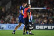 2 September 2022; Lee Barron of Leinster leaves the pitch with Leinster head of medical Professor John Ryan during the pre-season friendly match between Harlequins and Leinster at Twickenham Stoop in London, England. Photo by Brendan Moran/Sportsfile