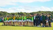 4 September 2022; Clonoulty-Rossmore players and management during a minutes silence in memory of the late Clonoulty-Rossmore GAA and Tipperary inter-county hurler Dillon Quirke, who passed away on August 5th 2022, before the Tipperary County Senior Club Hurling Championship Round 2 match between Clonoulty-Rossmore and Kilruane MacDonaghs in Templetuohy, Tipperary. Photo by Seb Daly/Sportsfile