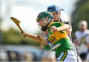 4 September 2022; Tommy Ryan of Clonoulty-Rossmore in action against James Cleary of Kilruane MacDonaghs during the Tipperary County Senior Club Hurling Championship Round 2 match between Clonoulty-Rossmore and Kilruane MacDonaghs in Templetuohy, Tipperary. Photo by Seb Daly/Sportsfile