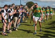 4 September 2022; Jack Ryan of Clonoulty-Rossmore and teammates are clapped off the pitch by Kilruane MacDonaghs players after the Tipperary County Senior Club Hurling Championship Round 2 match between Clonoulty-Rossmore and Kilruane MacDonaghs in Templetuohy, Tipperary. Photo by Seb Daly/Sportsfile