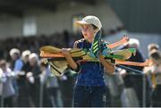4 September 2022; A young hurley carrier during the Tipperary County Senior Club Hurling Championship Round 2 match between Clonoulty-Rossmore and Kilruane MacDonaghs in Templetuohy, Tipperary. Photo by Seb Daly/Sportsfile