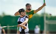 4 September 2022; Seamus Hennessy of Kilruane MacDonaghs in action against Jack Ryan of Clonoulty-Rossmore during the Tipperary County Senior Club Hurling Championship Round 2 match between Clonoulty-Rossmore and Kilruane MacDonaghs in Templetuohy, Tipperary. Photo by Seb Daly/Sportsfile