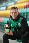 6 September 2022; Andy Lyons of Shamrock Rovers with the SSE Airtricity / SWI Player of the Month for August 2022 at Tallaght Stadium in Dublin. Photo by Ramsey Cardy/Sportsfile