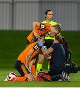 6 September 2022; Megan Campbell assisted by her Republic of Ireland team-mate Diane Caldwell receives medical attention from Republic of Ireland team doctor Siobhan Forman during the FIFA Women's World Cup 2023 Qualifier match between Slovakia and Republic of Ireland at National Training Centre in Senec, Slovakia. Photo by Stephen McCarthy/Sportsfile