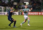 8 September 2022; Andy Lyons of Shamrock Rovers in action against Piotr Johansson of Djurgården during the UEFA Europa Conference League group F match between Shamrock Rovers and Djurgården at Tallaght Stadium in Dublin. Photo by Seb Daly/Sportsfile