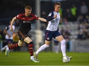 9 September 2022; Chris Forrester of St Patrick's Athletic in action against Darragh Nugent of Drogheda United during the SSE Airtricity League Premier Division match between Drogheda United and St Patrick's Athletic at Head in the Game Park in Drogheda, Louth. Photo by Piaras Ó Mídheach/Sportsfile