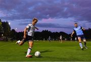 9 September 2022; Greg Sloggett of Dundalk and Sam Todd of UCD during the SSE Airtricity League Premier Division match between UCD and Dundalk at UCD Bowl in Dublin. Photo by Seb Daly/Sportsfile