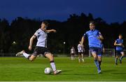 9 September 2022; Lewis Macari of Dundalk in action against Danny Norris of UCD during the SSE Airtricity League Premier Division match between UCD and Dundalk at UCD Bowl in Dublin. Photo by Seb Daly/Sportsfile