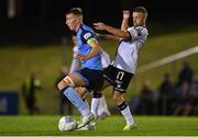 9 September 2022; Sam Todd of UCD in action against Keith Ward of Dundalk during the SSE Airtricity League Premier Division match between UCD and Dundalk at UCD Bowl in Dublin. Photo by Seb Daly/Sportsfile