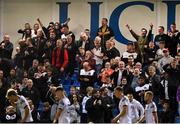 9 September 2022; Dundalk supporters celebrate their side's first goal, scored by Keith Ward, bottom right, during the SSE Airtricity League Premier Division match between UCD and Dundalk at UCD Bowl in Dublin. Photo by Seb Daly/Sportsfile