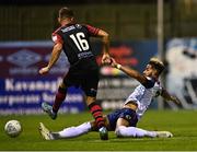 9 September 2022; Barry Cotter of St Patrick's Athletic slides in to tackle Dayle Rooney of Drogheda United during the SSE Airtricity League Premier Division match between Drogheda United and St Patrick's Athletic at Head in the Game Park in Drogheda, Louth. Photo by Piaras Ó Mídheach/Sportsfile