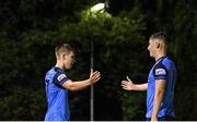 9 September 2022; Thomas Lonergan of UCD, left, celebrates with teammate Dylan Duffy after scoring their side's third goal during the SSE Airtricity League Premier Division match between UCD and Dundalk at UCD Bowl in Dublin. Photo by Seb Daly/Sportsfile