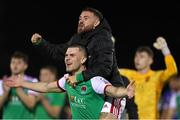 9 September 2022; Cork City players Aaron Bolger, and Dylan McGlade celebrate following their side's victory in the SSE Airtricity League First Division match between Waterford and Cork City at RSC in Waterford. Photo by Michael P Ryan/Sportsfile