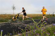 10 September 2022; 3 year old Oisin Denn with his father James from Cloran old, Cloneen, Co Tipperary and Eoin Feran from Malahide Dublin during the parkrun Ireland in partnership with Vhi, added a new parkrun at Fethard Town Park, Tipperary, on Saturday, 10th of September. parkruns take place over a 5km course weekly, are free to enter and are open to all ages and abilities, providing a fun and safe environment to enjoy exercise. To register for a parkrun near you visit www.parkrun.ie. Photo by Matt Browne/Sportsfile