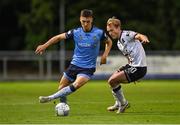 9 September 2022; Dylan Duffy of UCD in action against Greg Sloggett of Dundalk during the SSE Airtricity League Premier Division match between UCD and Dundalk at UCD Bowl in Dublin. Photo by Seb Daly/Sportsfile