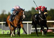 10 September 2022; Moracana, left, with Rory Cleary up, on their way to winning the Irish Stallion Farms EBF Petingo Handicap, from second place Golden Twilight, right, with Ronan Whelan up, on day one of the Longines Irish Champions Weekend at Leopardstown Racecourse in Dublin. Photo by Seb Daly/Sportsfile
