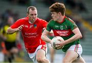 10 September 2022; Kieran Dennehy of Mid Kerry in action against Colm Ó Muircheartaigh of West Kerry during the Kerry County Senior Football Championship Round 1 match between Mid Kerry and West Kerry at Austin Stack Park in Tralee, Kerry. Photo by Brendan Moran/Sportsfile