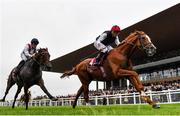 11 September 2022; Kyprios, right, with Ryan Moore up, on their way to winning the Comer Group International Irish St Leger, from second place Hamish, left, with Richard Kingscote up, on day two of the Longines Irish Champions Weekend at The Curragh Racecourse in Kildare. Photo by Seb Daly/Sportsfile