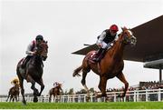 11 September 2022; Kyprios, right, with Ryan Moore up, on their way to winning the Comer Group International Irish St Leger, from second place Hamish, left, with Richard Kingscote up, on day two of the Longines Irish Champions Weekend at The Curragh Racecourse in Kildare. Photo by Seb Daly/Sportsfile