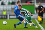 11 September 2022; Jack Byrne of Shamrock Rovers in action against Ryan Rainey of Finn Harps during the SSE Airtricity League Premier Division match between Shamrock Rovers and Finn Harps at Tallaght Stadium in Dublin. Photo by Ramsey Cardy/Sportsfile