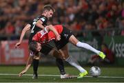 13 September 2022; Will Patching of Derry City is tackled by Lewis Banks of Sligo Rovers during the SSE Airtricity League Premier Division match between Derry City and Sligo Rovers at The Ryan McBride Brandywell Stadium in Derry. Photo by Ramsey Cardy/Sportsfile